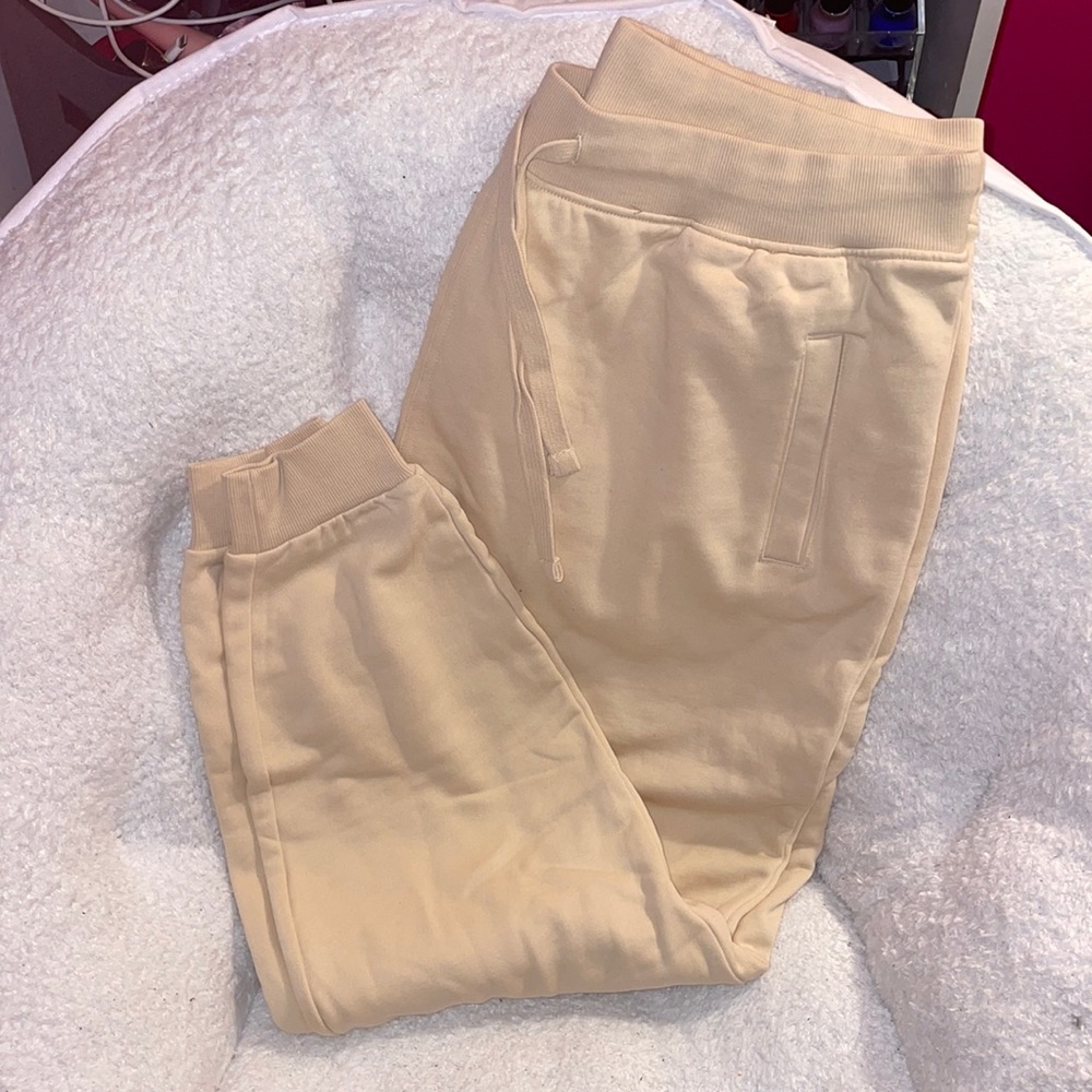 Cream sweatpants